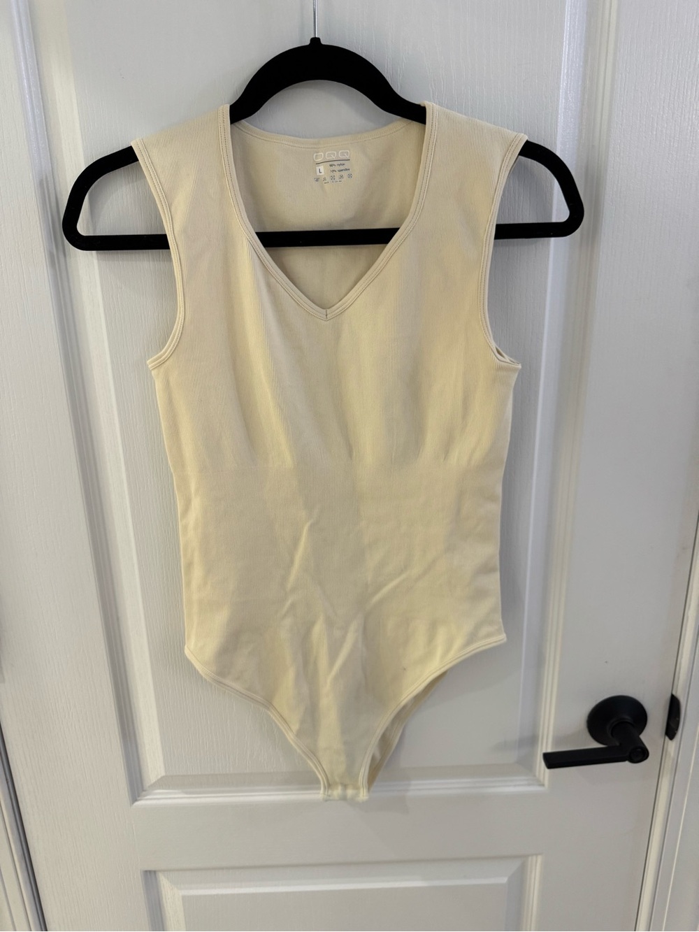 Sleeveless V-Neck Cream Bodysuit
